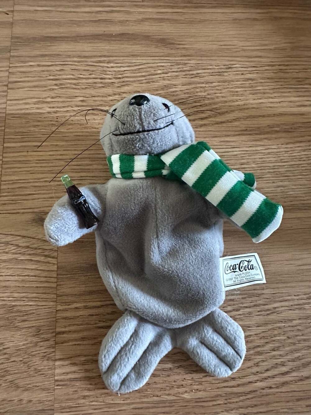 1997 Coca-Cola Brand Plush Seal with Green Scarf and Bottle